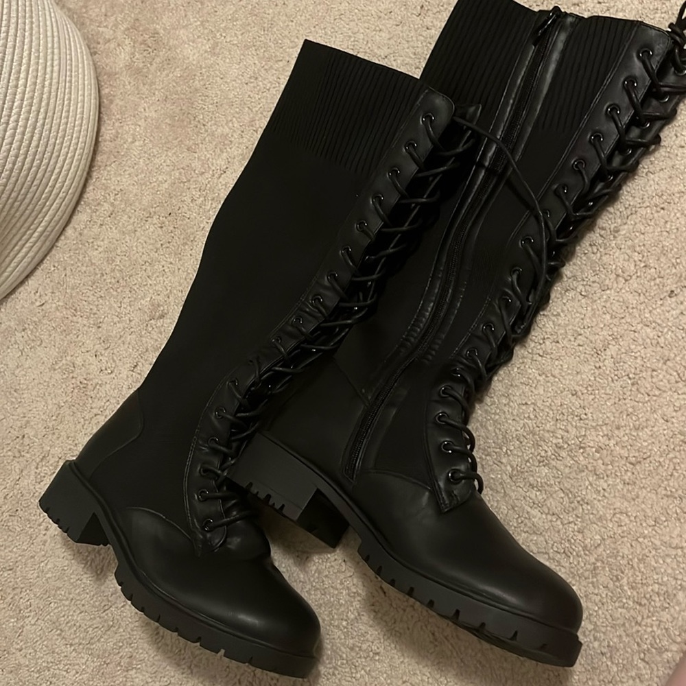 Knee high lace up boots